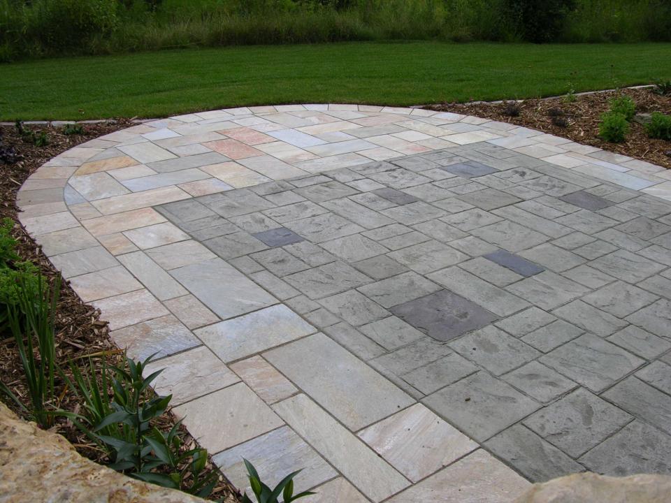 Patios Yardmasters Landscaping Company Stamped Patio With Natural Stone Surround